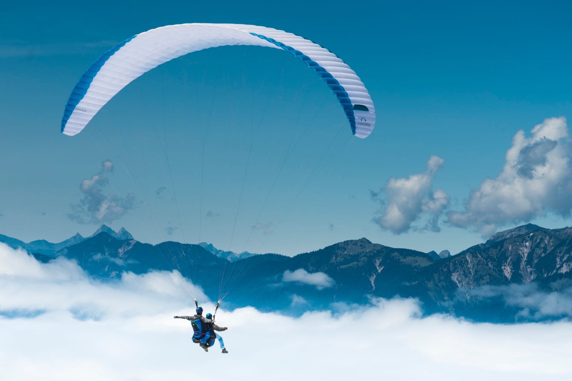 Tandem flight above a sea of clouds